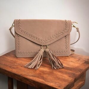 Blush pink crossbody bag adj. Strap, multiple inner compartments/pouch, zipper